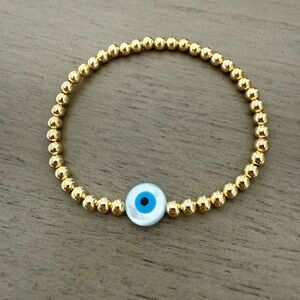 Evil eye gold plated beaded bracelet